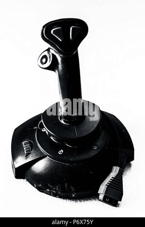 Vintage Joy stick used for playing pc/video game isolated on white.  Concept of gaming. Stock Photo