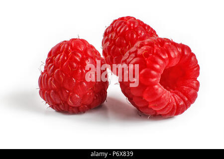 Three raspberries isolated on white background Stock Photo