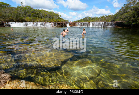 Tourists swimming at picturesque Fruit Bat Falls, a population destination in the Cape York Peninsula, Far North Queensland, FNQ, QLD, Australia Stock Photo