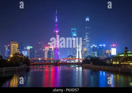 Pudong skyline across the Suzhou Creek and Waibaidu bridge, Shanghai, China