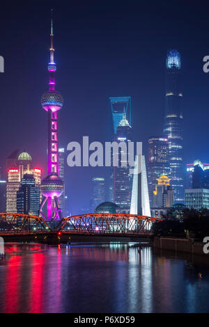 Pudong skyline across the Suzhou Creek and Waibaidu bridge, Shanghai, China