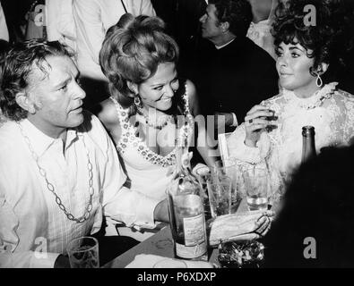 richard burton, claudia cardinale, liz taylor, party, venice film festival 1962 Stock Photo