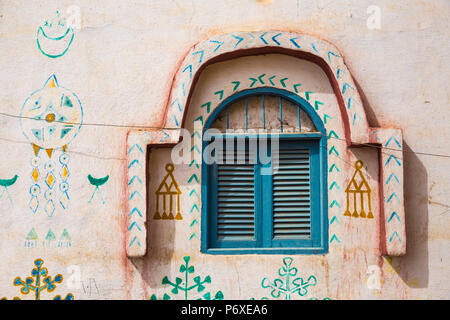 Egypt, Upper Egypt, Aswan, Blue window shutters on house in Nubian village on Elephantine Island Stock Photo