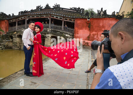 Photo session in front of the Japanese covered bridge, Hoi An , Vietnam Stock Photo