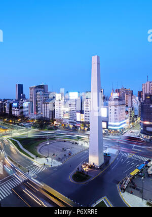 Argentina, Buenos Aires Province, City of Buenos Aires, Twilight view of 9 de Julio Avenue, Plaza de la Republica and Obelisco de Buenos Aires. Stock Photo