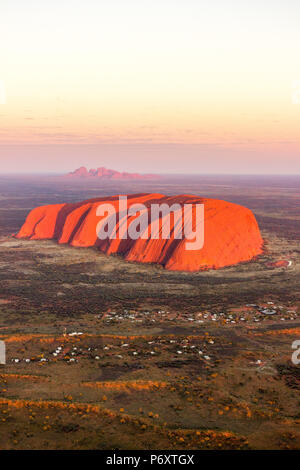 Uluru and Kata Tjuta at sunrise, Aerial view. Northern Territory, Australia Stock Photo