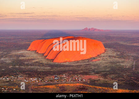 Uluru and Kata Tjuta at sunrise, Aerial view. Northern Territory, Australia Stock Photo