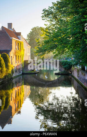 Belgium, West Flanders (Vlaanderen), Bruges (Brugge). Buildings along the Groenerei canal at dawn. Stock Photo
