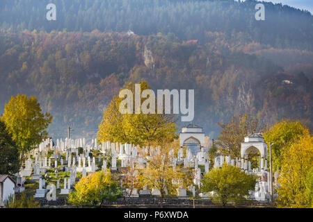 Bosnia and Herzegovina, Sarajevo, View of Alifakovac graveyard (where Muslim foreigners are buried) and City Stock Photo