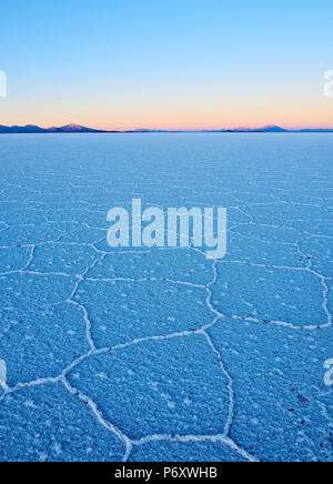 Bolivia, Potosi Department, Daniel Campos Province, View of the Salar de Uyuni, the largest salt flat in the world at sunrise. Stock Photo