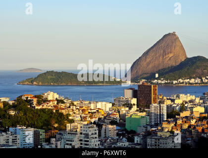 Brazil, City of Rio de Janeiro, Santa Teresa Neighbourhood, View over Catete and Flamengo towards Sugarloaf Mountain from Parque das Ruinas. Stock Photo