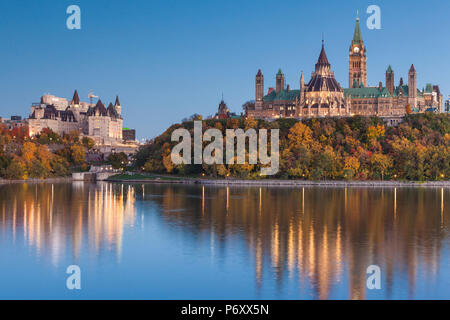 Canada, Ontario, Ottowa, capital of Canada,  Chateau Laurier Hotel and Parliament Hill, dusk Stock Photo