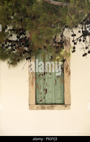 Detail of an uninhabited traditional Venetian-style house in Mirties, Kalymnos, Greece Stock Photo