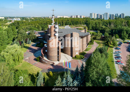 Katowice, Poland - June 8, 2018: Modern Church of the Exaltation of the Holy Cross and Our Lady Health of the Sick in Katowice, built in 1991. Aerial  Stock Photo