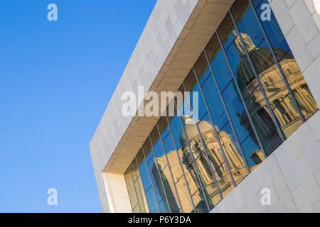 England, Merseyside, Liverpool, The Three Graces  reflecting in the window of The Museum of Liverpool Stock Photo