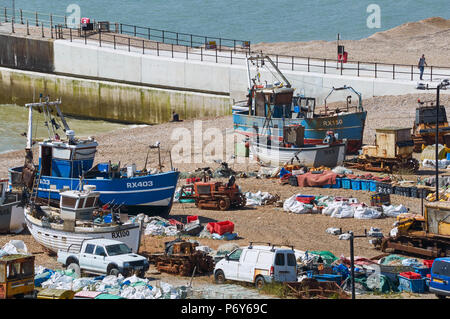 Beached fishing boats on the Stade at Hastings, East Sussex, UK, viewed from East Hill Stock Photo