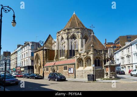 Robertson Street in Hastings town centre, East Sussex, UK, with the Victorian Holy Trinity church Stock Photo