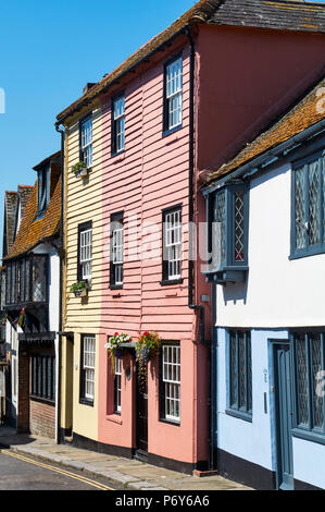 Colourful weatherboarded houses along All Saints Street in Hastings Old Town, East Sussex, Southern England Stock Photo