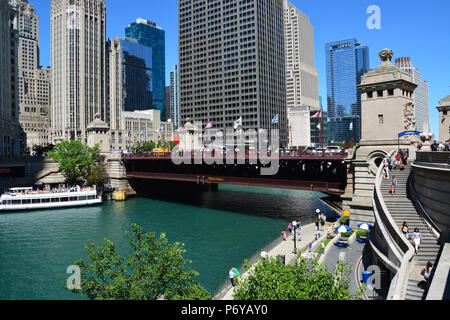 Chicago's iconic Michigan Ave. Bridge opened in 1920 and features for limestone bridge houses commemorating moments in the cities early history Stock Photo
