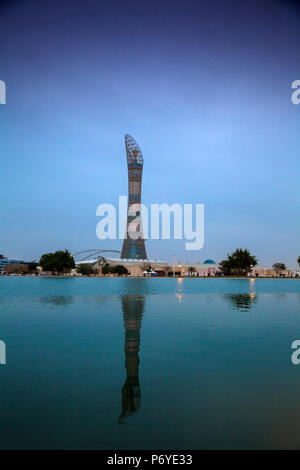 Qatar, Doha,  The Torch Hotel reflecting in the lake in Aspire Park Stock Photo