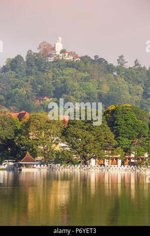 Sri Lanka, Kandy,  Bahiravokanda Vihara Buddha Statue above Kandy Lake and the Temple of the Tooth Stock Photo