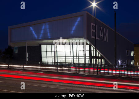 Dusk shot of south facade from across A10. ELAM, London, United Kingdom. Architect: Hunters South, 2018. Stock Photo