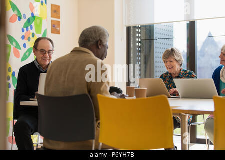 Senior business people working in meeting Stock Photo