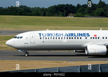 Turkish Airlines Boeing 737-900ER taxiing for take off at Birmingham Airport, UK (TC-JYC) Stock Photo