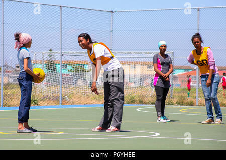 Cape Town, South Africa, December 06, 2011, Diverse children playing Netball at school Stock Photo