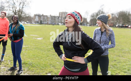 Women exercising in park Stock Photo