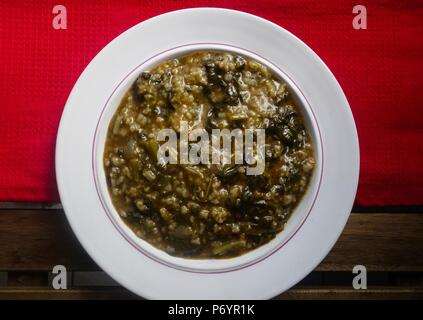 Greek Cuisine. Spinach and Rice – Spanakorizo Stock Photo