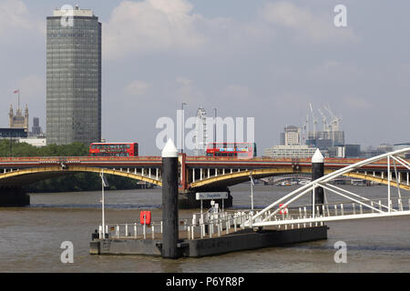 London Bus crossing the Vauxhall Bridge in London Stock Photo