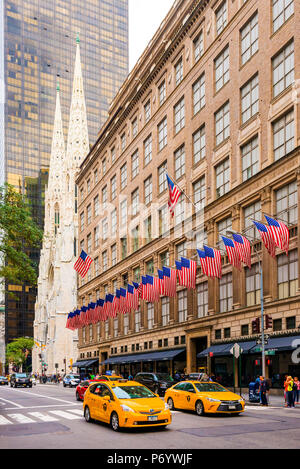 Flags outside St Patricks Cathedral on 5th Avenue, New York, USA Stock Photo