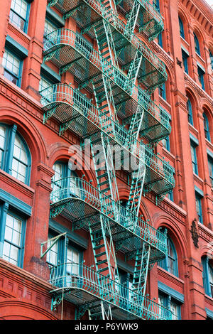 Fire escapes on buildings in Soho, New York, USA Stock Photo