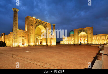 The Registan square and two of its  madrasahs. From left to right: Ulugh Beg and Sher-Dor Madrasah. A Unesco World Heritage Site, Samarkand. Uzbekistan Stock Photo