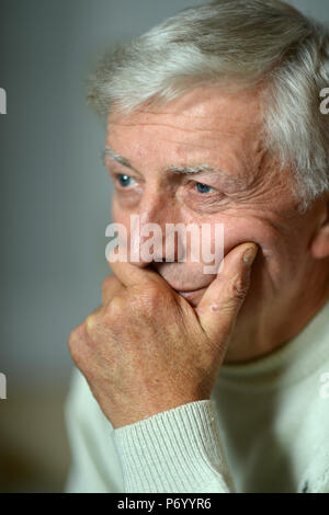 Thoughtful elderly man Stock Photo