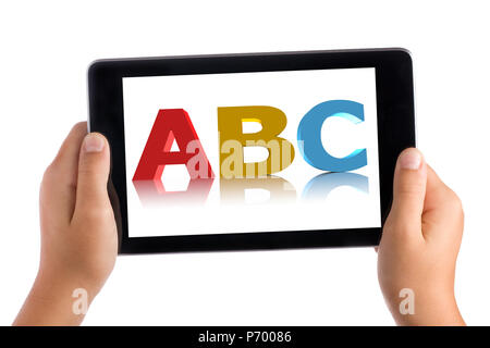 Kid Learning ABC with tablet pc isolated Stock Photo