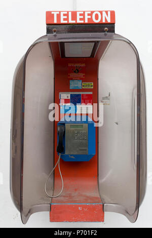 An old public telephone kiosk in the central Slovenian rural town of Kamnik, on 25th June 2018, in Kamnik, Slovenia. Stock Photo