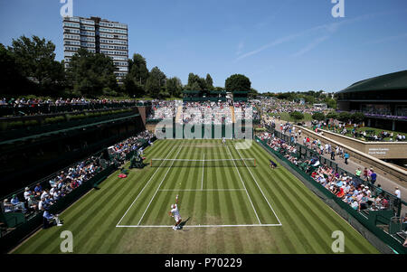 Jay Clarke serves on day two of the Wimbledon Championships at the All England Lawn Tennis and Croquet Club, Wimbledon. Stock Photo