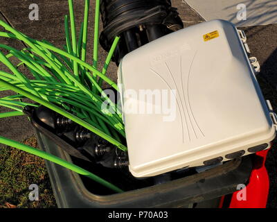 Melbourne, Australia - May 14, 2018: Rubbish bin full of NBN fibre optic cables and accessories Stock Photo