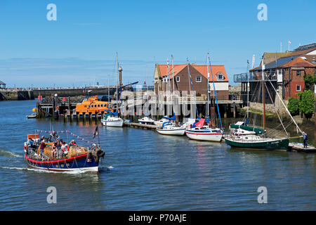 Old lifeboat used for boat trips, Whitby, North Yorkshire, England UK Stock Photo