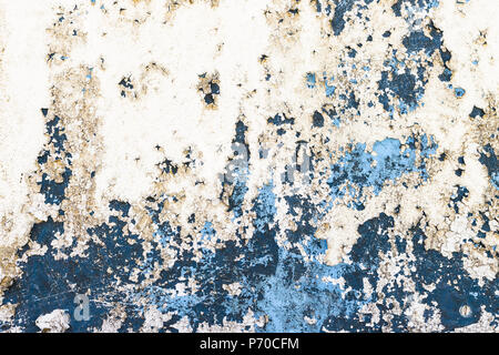 Background of rusty, white, blue colored metal surface. Stock Photo