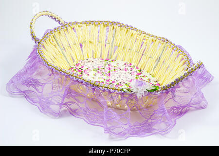 Basket wicker / Wicker basket with fabric floral Lace / Empty wicker basket on white background Stock Photo