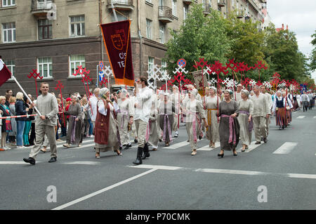 RIGA, LATVIA, JULY 1, 2018: National Song and Dance Festival, festive opening parade in the capital city with all participants dressed up in costumes Stock Photo