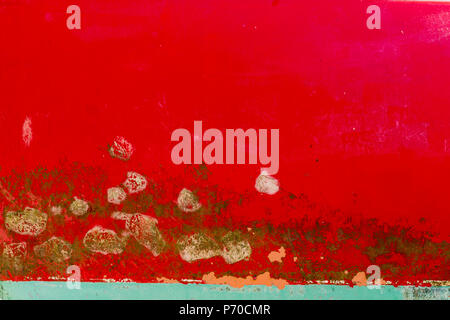 Background of rusty, red, blue and yellow colored metal surface. Stock Photo