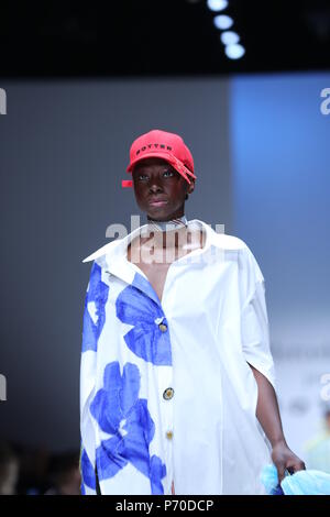 Berlin, Germany. 03rd July, 2018. Berlin: The photo shows a model on the catwalk with the spring/summer 2019 collection by the Botter. Credit: Simone Kuhlmey/Pacific Press/Alamy Live News Stock Photo