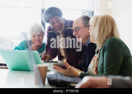 Senior business people talking in conference room meeting Stock Photo