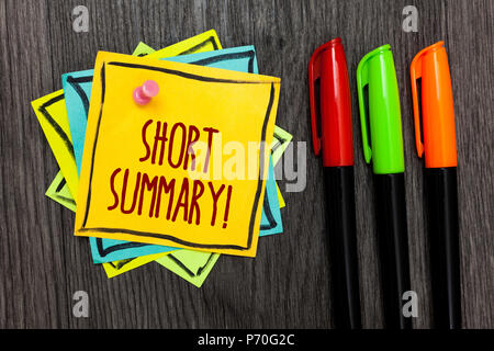 Text sign showing Short Summary Motivational Call. Conceptual photo Brief statement of main points clear Three marker pens four small art papers impor Stock Photo