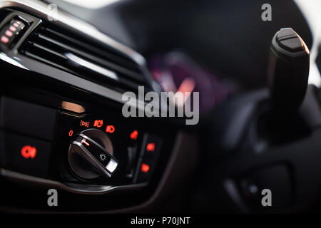 Close up shot of a car's light switch. Stock Photo