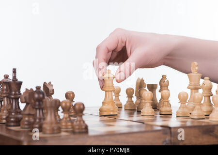 cropped image of businesswoman playing chess isolated on white, business concept Stock Photo